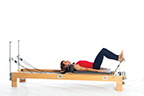 <p><strong>Setup</strong></p><ul><li><p>Lying supine in neutral spine position, hips externally rotated, heels placed on outside edge of footbar, wide V position</p></li><li><p>Resistance: medium to heavy | <strong>Springs: 3R or 3R+ 1B</strong></p></li></ul><p><strong>Movement</strong></p><ul><li><p>Exhale: Straighten legs</p></li><li><p>Inhale: Bend legs, return to start position</p></li></ul><p><strong>Muscle Focus</strong></p><ul><li><p>Hip extensors</p></li><li><p>Knee extensors</p></li></ul><p><strong>Objectives</strong></p><ul><li><p>Hip extensor control</p></li><li><p>Knee extensor strength</p></li><li><p>Ankle and foot control</p></li><li><p>Hip adductor control</p></li><li><p>Pelvic lumbar stabilization</p></li></ul><p><strong>Cues</strong></p><ul><li><p>Initiate movement with hip extensors</p></li><li><p>Engage hip adductors</p></li><li><p>Keep feet dorsiflexed and stable as if standing on the floor</p></li><li><p>Straighten legs completely, avoiding hyperextension</p></li><li><p>Maintain pelvic lumbar stabilization</p></li></ul><p></p>