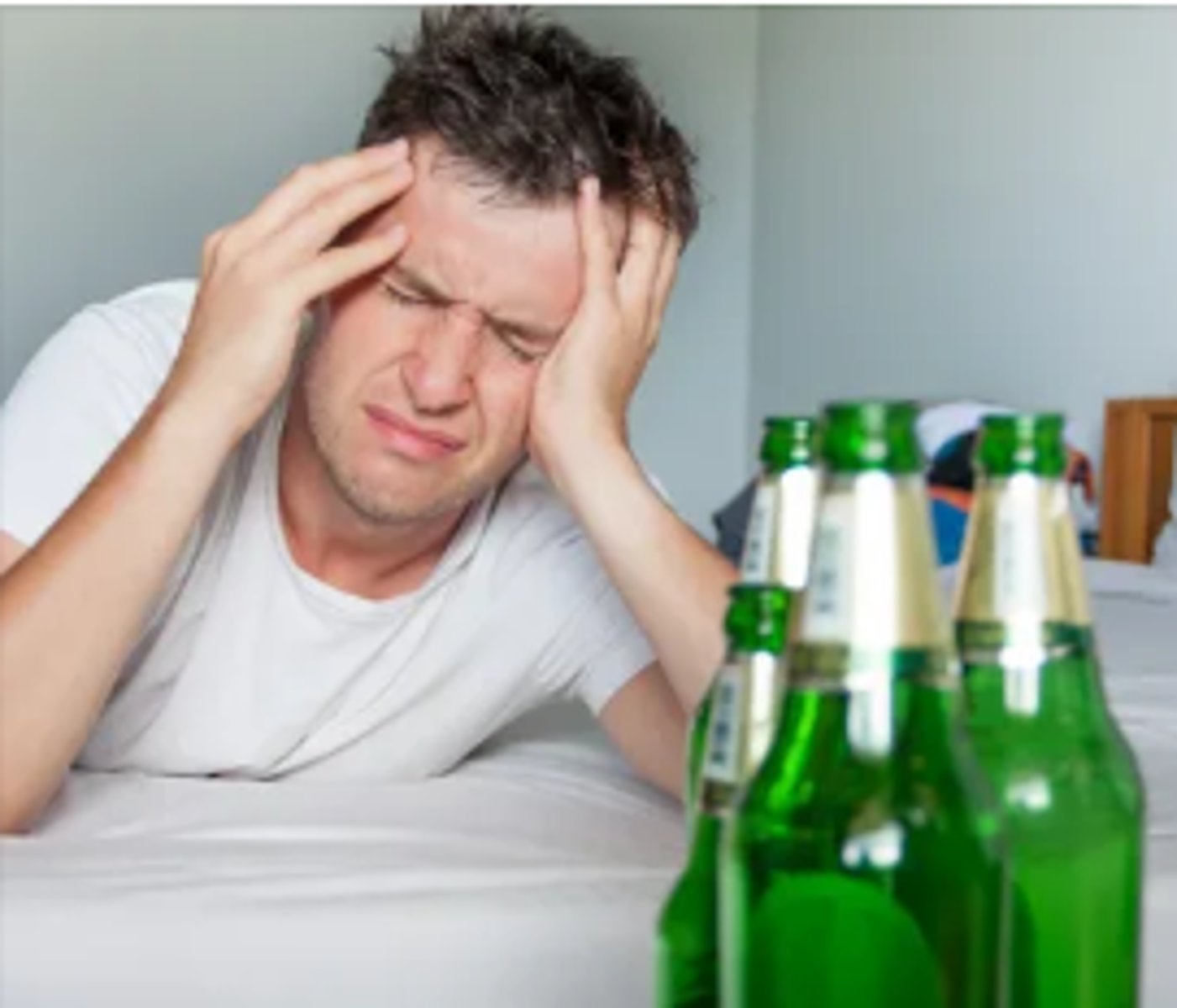 <p>feeling ill with a bad headache and often wanting to vomit after having drunk too much alcohol</p>