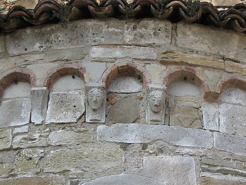 <p>a decorative blind arcade, usually exterior; rhythmic ornamental arches</p>