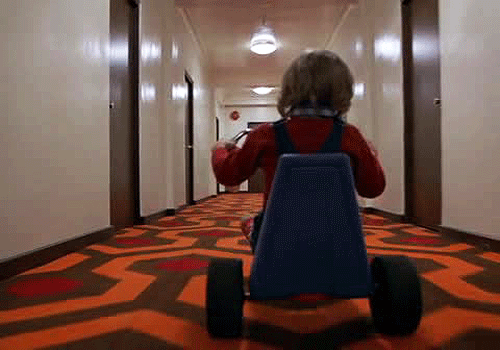 <p>Moves the camera <strong>alongside the subject</strong> to generate questions such as “where is the character going, and what will happen?” Immersing the viewer in a long take</p>
