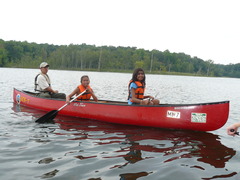 <p>to go down a river by canoe</p>