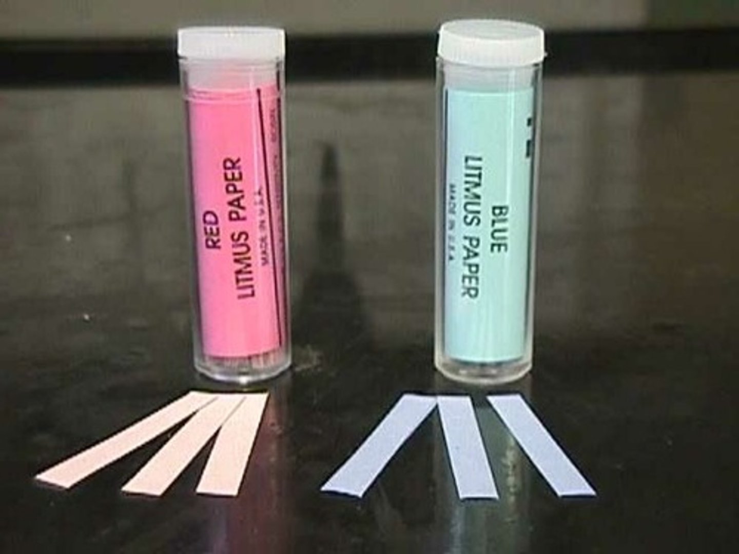 <p>an indicator paper that turns red in an acid and blue in a base</p>