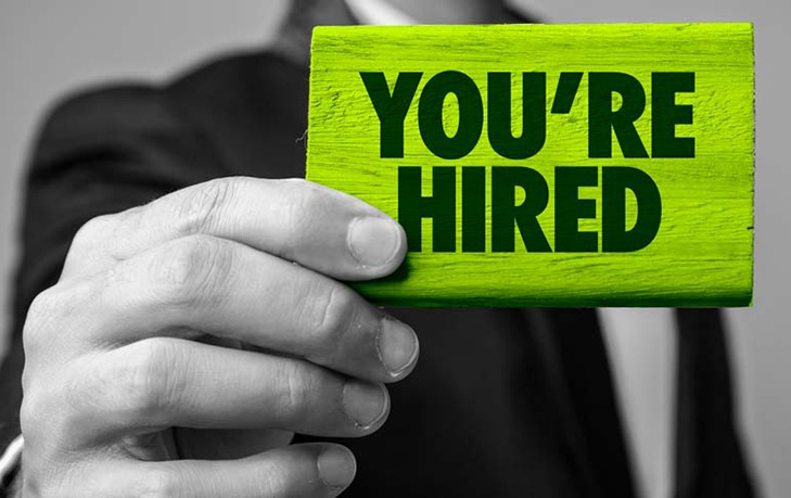 <p>get hired </p><p>(I was so happy when I got hired.)</p>