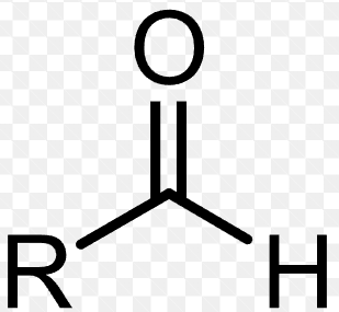 <p>a carbonyl group (C=O) that is bonded to at least 1 H atom</p>