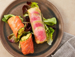<p>A duo of rice-paper-wrapped organic curry chicken salad with watermelon radish, carrots, sprouts and collard greens, and a side of pineapple-mango chutney.</p><p>Extra Pineapple Chutney available for $1.95</p><p>Modifications: None</p><p>Allergens: Soy, Coconut</p>