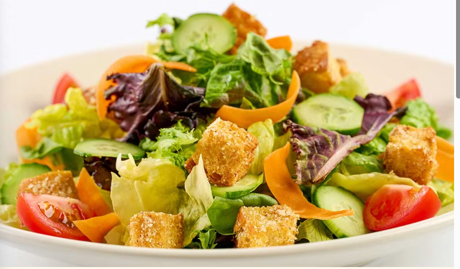 <p>Mixed Greens, Assorted Vegetables, Tomato and Croutons with Your Choice of Dressing</p>