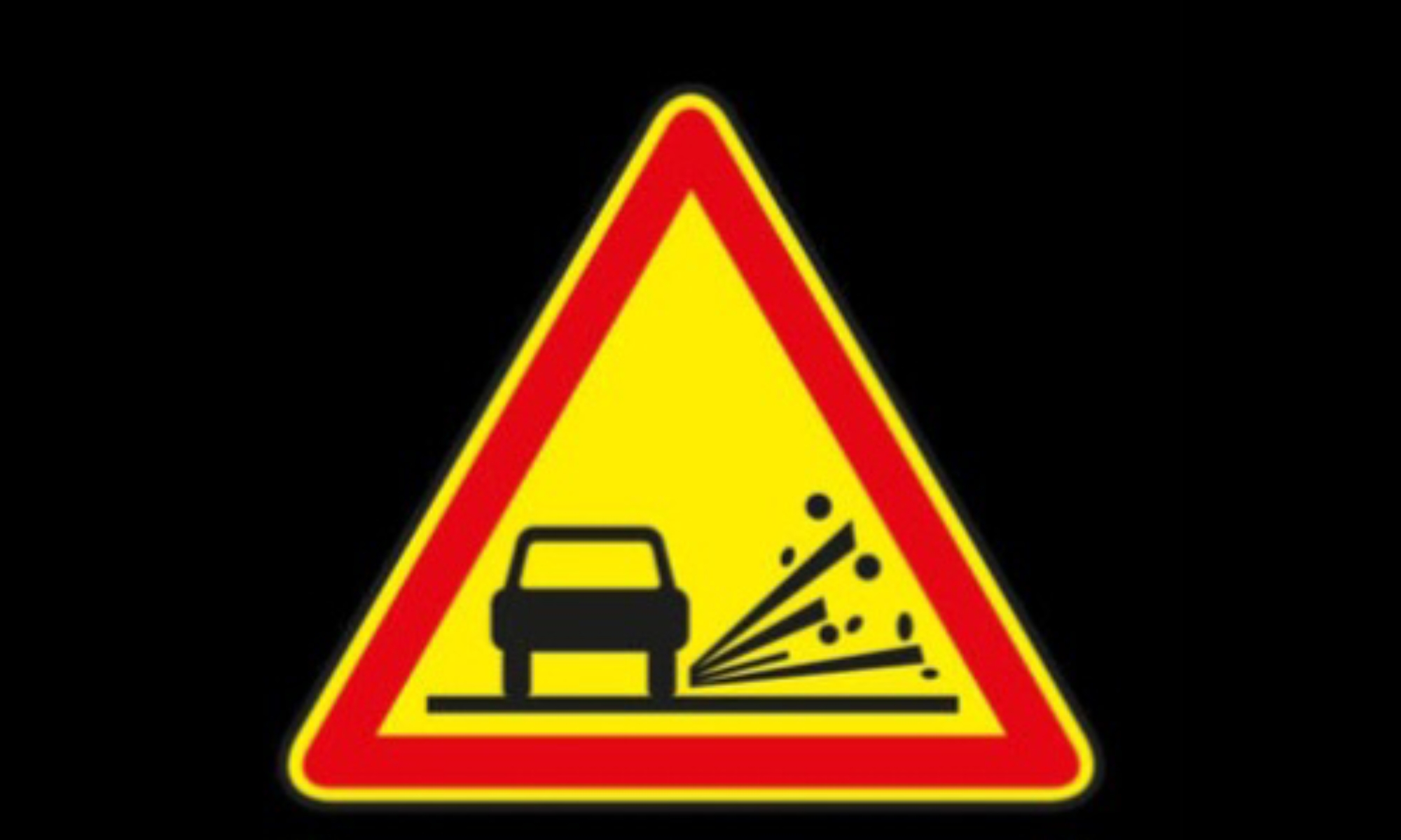 <p>Que signale le panneau temporaire avec des gravillons (voiture projetant des cailloux) et quels sont les risques ?</p>