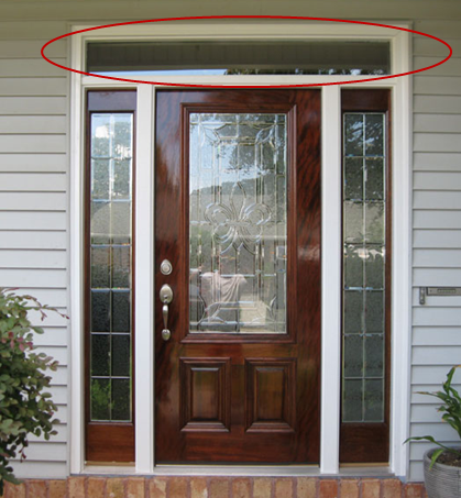 <p>A window located over a door.</p>