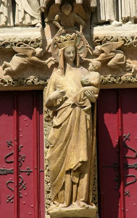 <p>Ruskin compares at length the <em>Golden Virgin</em> (of the south porch) of Amiens to</p>