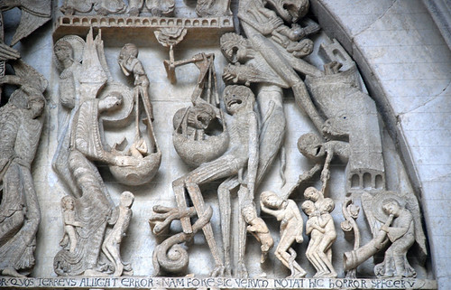 <p><span>On the right (image detail above), well....things aren't looking good. These are the condemned.</span></p><p><span>-The "weighing of souls" is taking place in those sack-like scales with angels trying to intervene but the demons seem to be winning--grabbing souls with their clawed hands, cackling with gaping mouths and swooping in with their lizard-like bodies.</span></p><p><span>-The register below is made up of the souls of the dead awaiting judgment. Some of the central figures carry either a cross or shell which would be recognized as symbols that these were pilgrims to Jerusalem or Santiago de Compostela, respectively--major points for getting them into heaven!</span></p>
