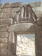 <p><em>The Lion Gate</em>, Palace of Mycenae, ca. 1300 B.C.E., limestone</p><p><span>•Lintel block with relief carving of two lions flanking a column</span></p><p><span>•Head of animals (today lost) would have been made of stone or metal</span></p><p><span>•Composition recalls Mesopotamian <u>heraldic iconography</u>, underlining artistic exchanges and cross-cultural influences with eastern Mediterranean cultures</span></p>
