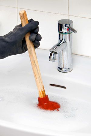 <p>unable to let something pass through</p><p></p><p><strong>Common collocations</strong></p><ul><li><p>___ sink</p></li><li><p>___ toilet</p></li></ul><p></p><p><em>The sink is ____.</em></p><p><em>The toilet became ____.</em></p>