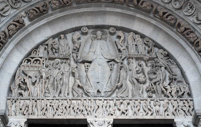 <p>The tympanum of St. Lazare at Autun depicts the Last Judgment, an iconic representation of the final assessment of souls, showcasing the duality of salvation and damnation in Romanesque art. </p>