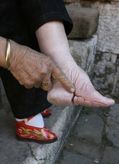 <p>Becoming prominent during the Song dynasty, practice in Chinese society to mutilate women's feet in order to make them smaller; produced pain and restricted women's movement; made it easier to confine women to the household.</p>