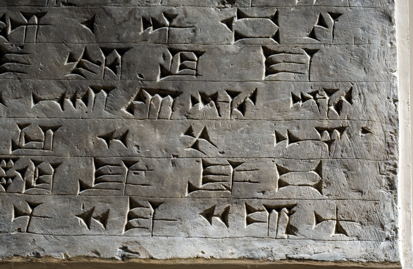 <p>A writing system developed around 3000 BCE. pictograms pressed into a clay tablet with a stylus.</p>