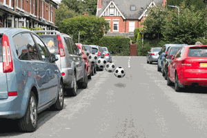 <p>You're driving past a line of parked cars. What should you do if a ball bounces out into the road ahead?</p>
