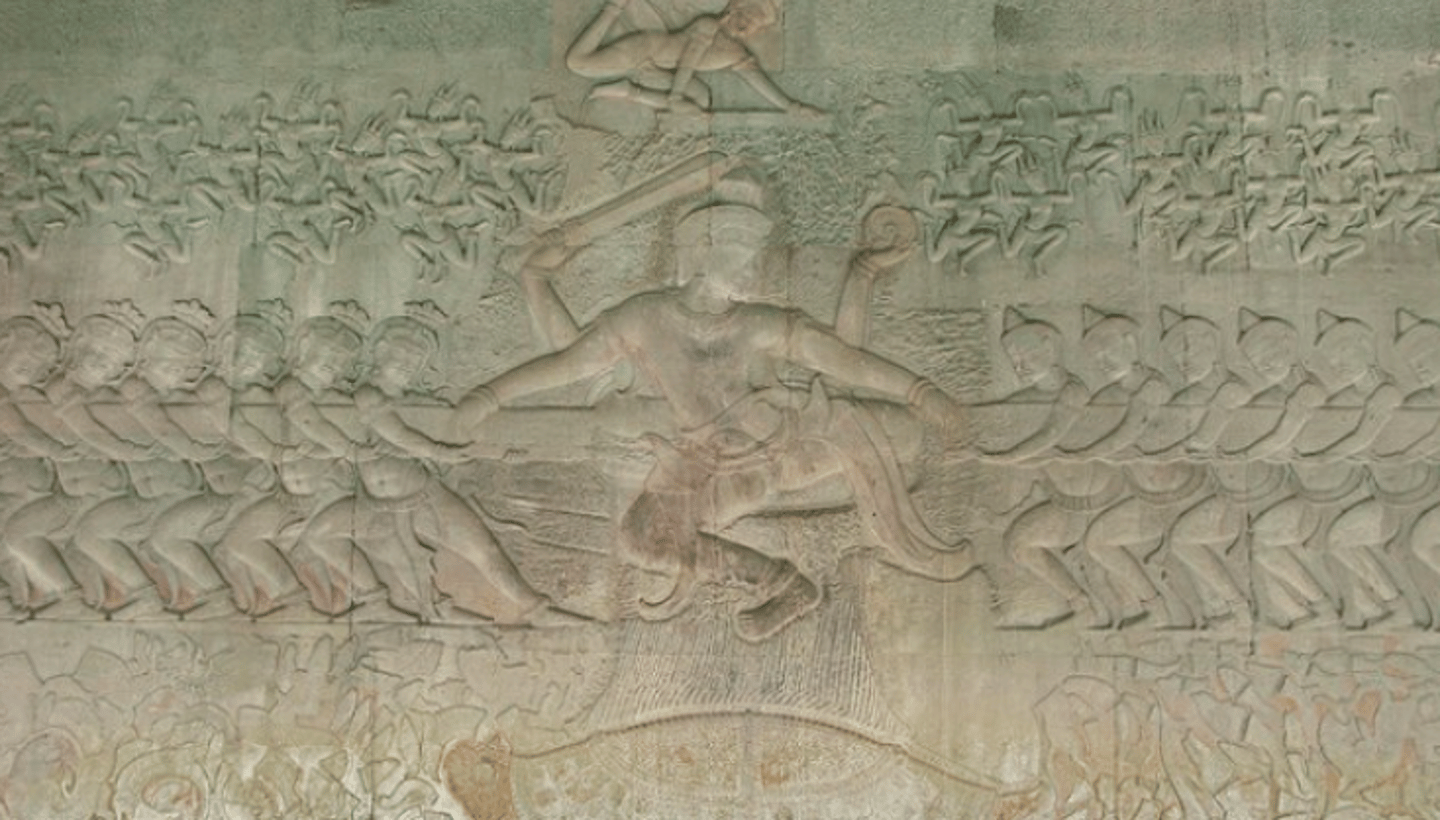 <p>Part of Angkor Wat.</p><p>Shows the Gods and demons churning the ocean of milk with a snake in order to get the Nectar of Immortality. The sculpture is also used to mark the times of the year; during the summer solstice, the Gods are completely in light, while the demons in shadow, and vice versa during the Winter Equinox.</p>