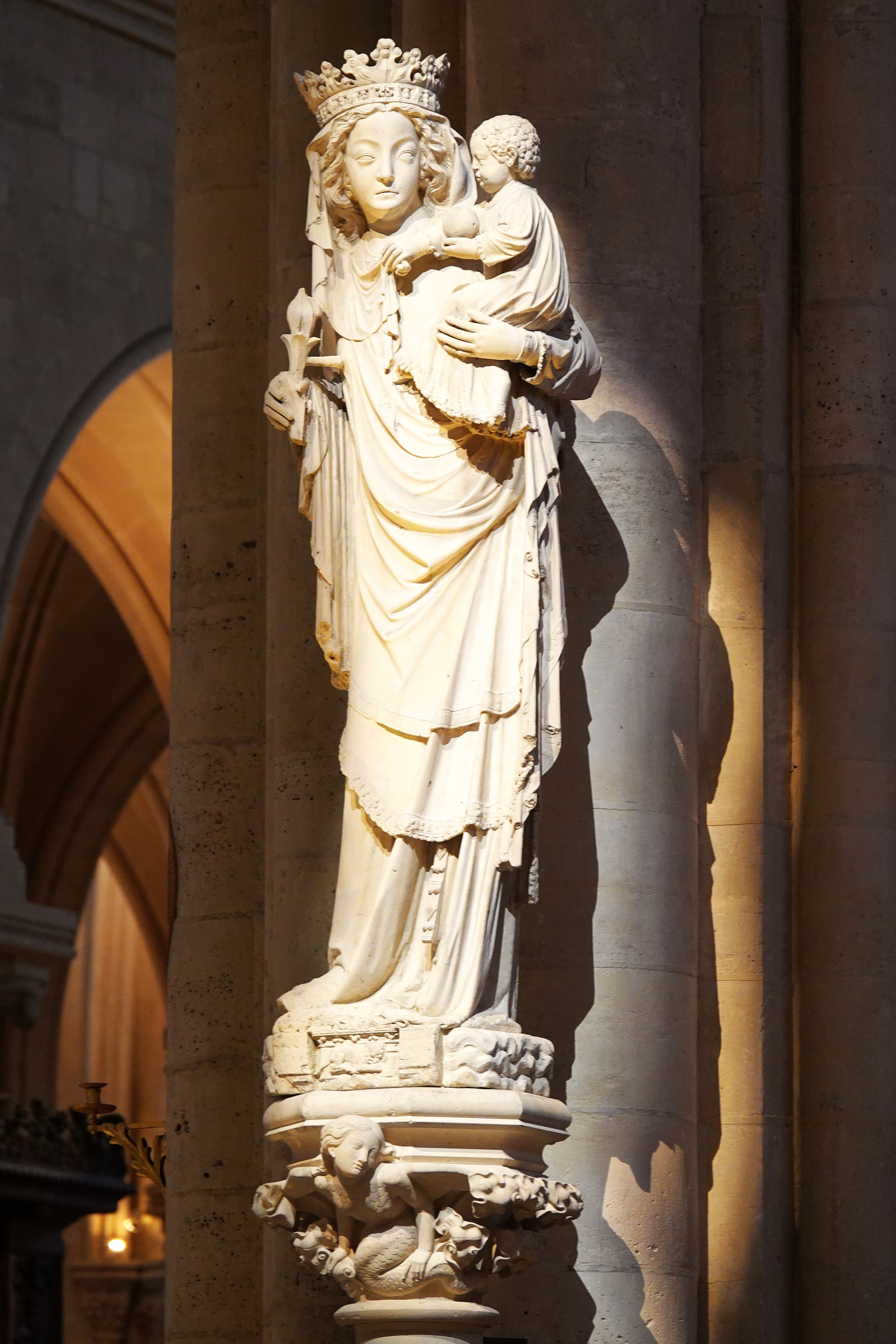 <p>stone</p><p></p><p>Commissioned for the royal cathedral of Paris. Shifts away naturalism of the high gothic towards more decorative</p>