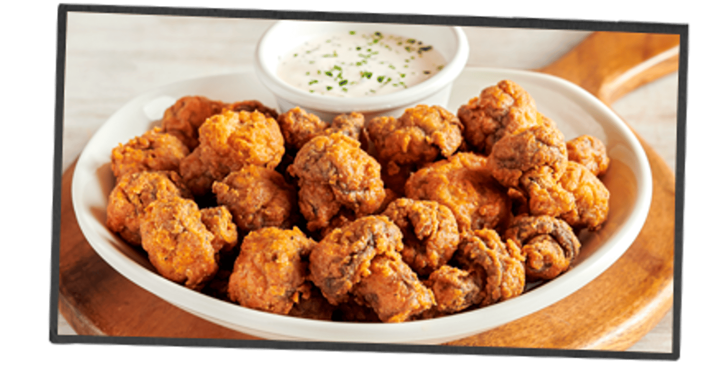 <p>Lightly batter and fried mushrooms served with house-made ranch dressing.</p>