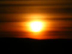<p>metaphor - it compares Juliet to the sun</p>