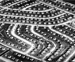 <p><span>Suburban developments created after WWII. Production was modeled in an assembly line manner and thousands of similar or identical homes were produced easily and quickly, allowing rapid recovery of costs.</span></p><p></p><p><span>is the name of four large suburban developments created in the United States of America by William Levitt and his company Levitt &amp; Sons. Built after World War II for returning veterans and their new families, the communities offered attractive alternatives to cramped central city locations and apartments.</span></p><p></p><p><span>1950's. Suburbia. After WWII William Levitt mass produced suburban houses. Very uniform. Enforced restriction of gender relations and was a segregated environment.</span></p>