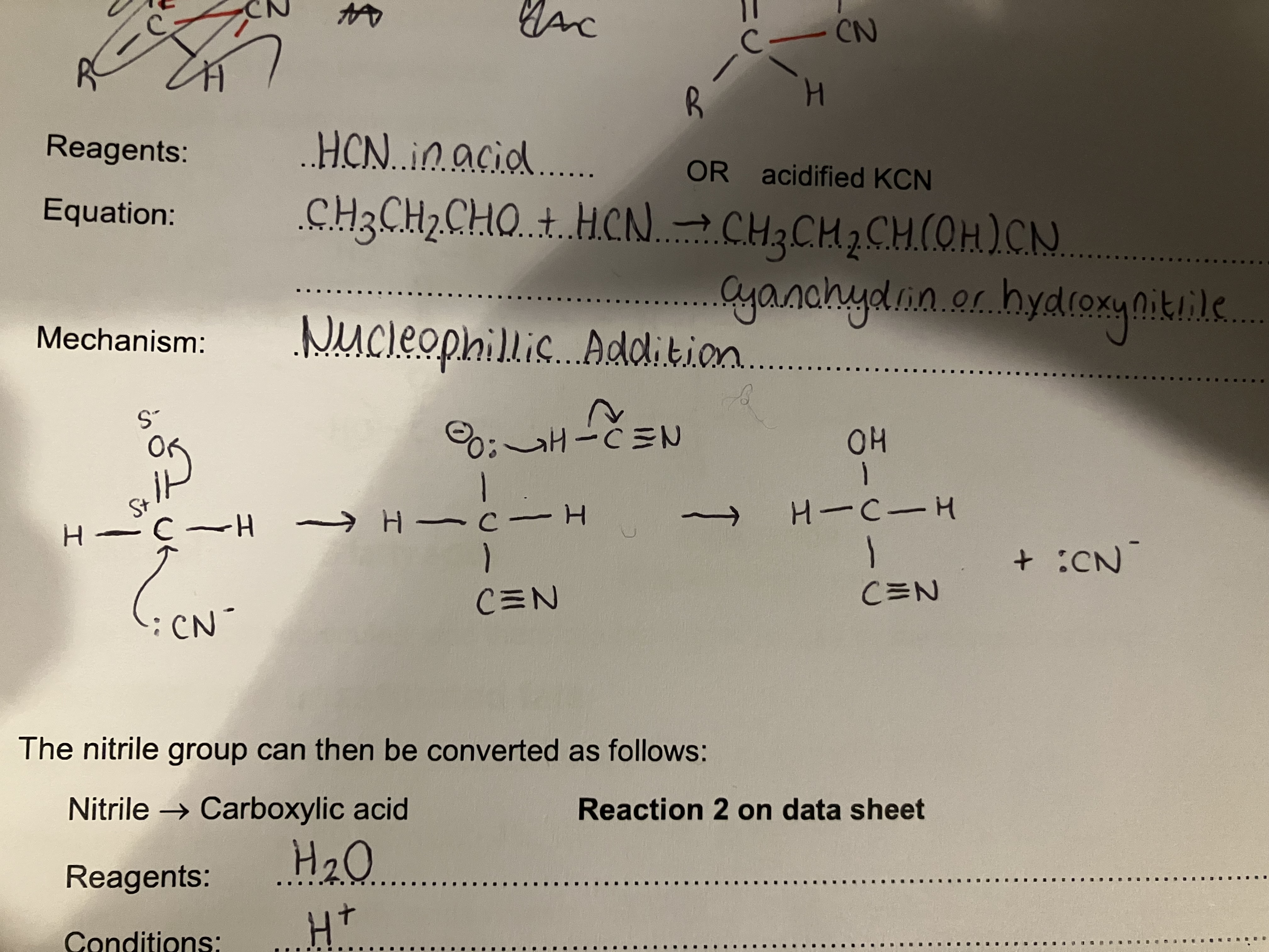 <p>Nucleophillic Addition</p><p>Reagents - acidified HCN or KCN</p><p>Equation - CH<sub>3</sub>CH<sub>2</sub>CHO<sub> </sub>+ HCN → CH<sub>3</sub>CH<sub>2</sub>CH(OH)CN</p><p>Hydroxynitrile formed </p>