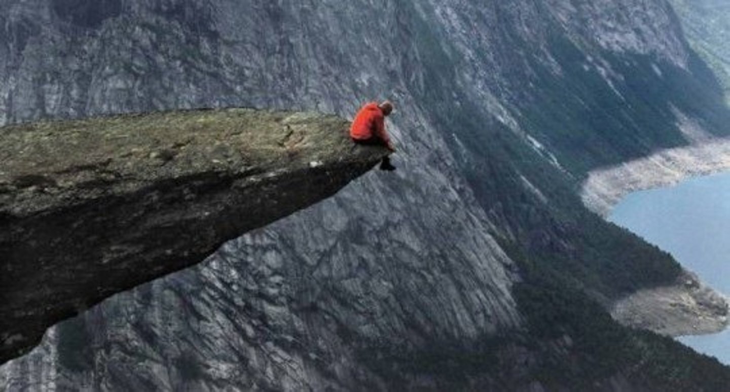 <p>a narrow, flat piece of rock that sticks out from a cliff</p>