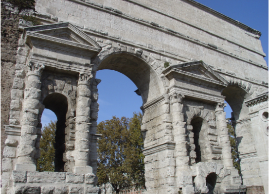 <ul><li><p><span style="background-color: transparent;">Monumental portal/ gate where two aqueducts converge</span></p></li><li><p><span style="background-color: transparent;">Trapezoidal monument with forms imitating bread-making</span></p></li><li><p><span style="background-color: transparent;">Rusticated architecture– Deliberate unfinished look, architectural origins&nbsp;</span></p></li><li><p><span style="background-color: transparent;">Pediments are highly finished</span></p></li><li><p><span style="background-color: transparent;">Capitals are more finished than shafts, still kind of rusticated&nbsp;</span></p></li><li><p><span style="background-color: transparent;">Triple attic for channels of water&nbsp;</span></p></li><li><p><span style="background-color: transparent;">Esoteric, evocative, aquatarian form</span></p></li></ul><p></p>