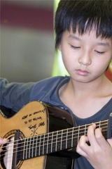 <p>someone young who has a great natural ability for music</p>