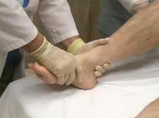 <p>lifting the anle off the bed and raising the big toe. gravity may do its thing</p>