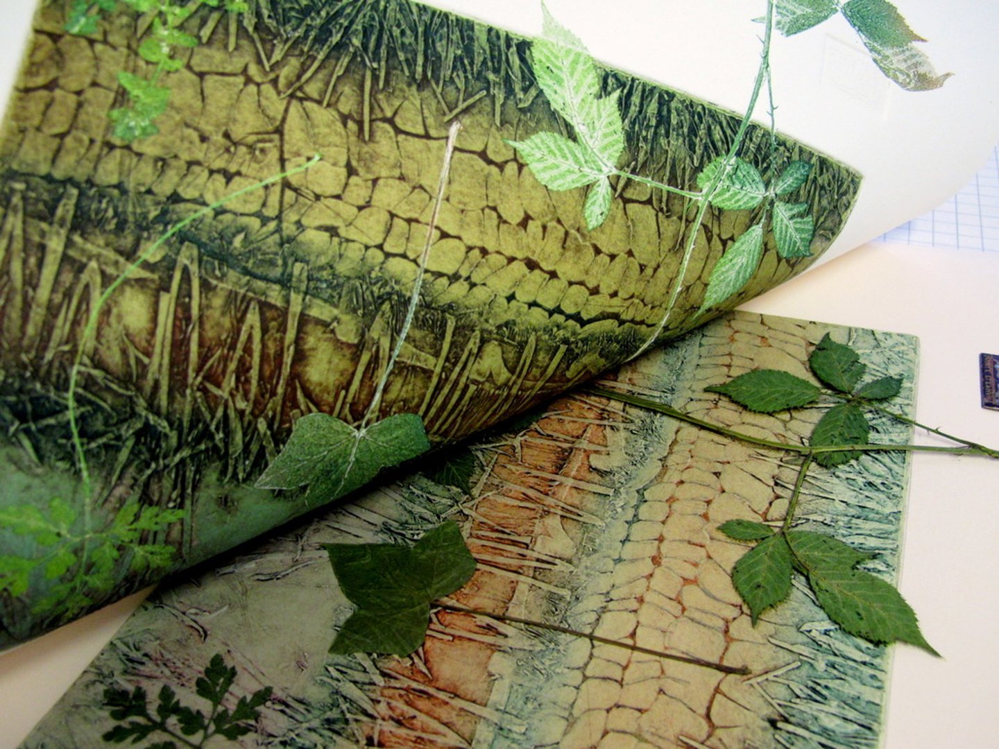 <p>a collage of materials of various textures glued on to a printing plate, often a thin wood or cardboard.</p>