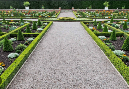 <p>a style of landscape architecture characterized by form and visual order as</p><p>expressed through a symmetrical plan, rigid geometries, and long straight roads and</p><p>sight lines.</p>