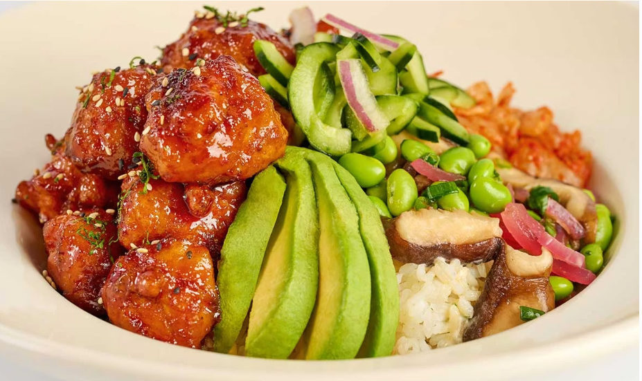 <p>Crispy Chicken Tossed with Our Spicy Korean B.B.Q. Sauce and Served Over Steamed Rice with Avocado, Kimchi, Mushrooms, Cilantro and Sesame Seeds</p>