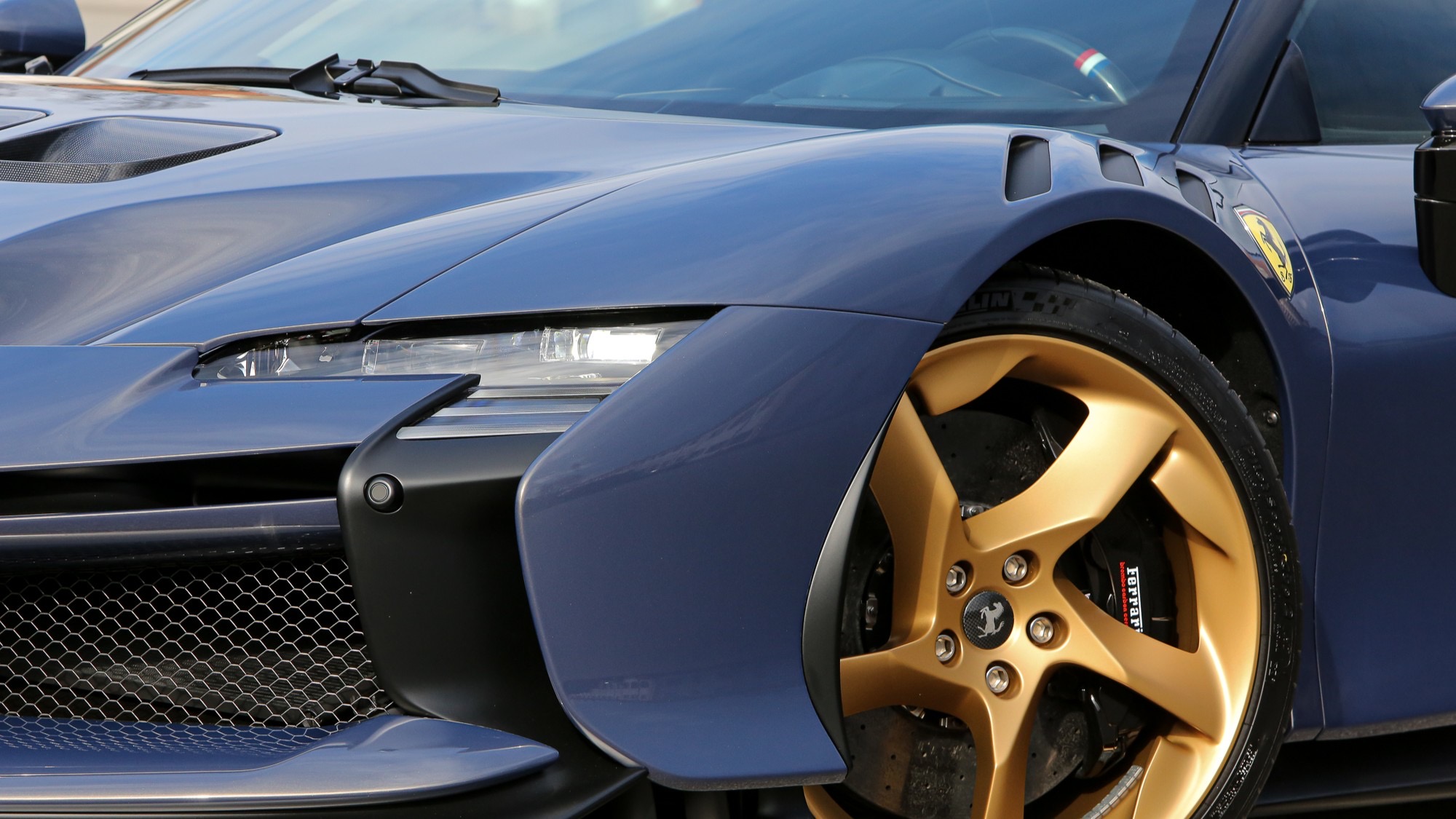 <p>The curved opening around the wheel</p>