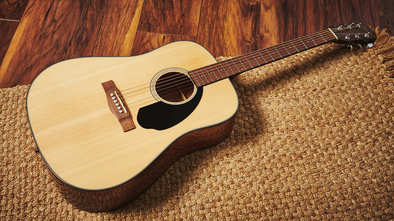 <p>guitar (n) /ɡɪˈtɑː/</p>
