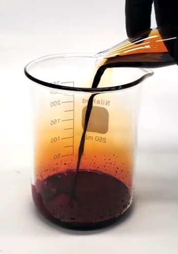 <p>orange-brown liquid (easily vaporises into a gas)</p>