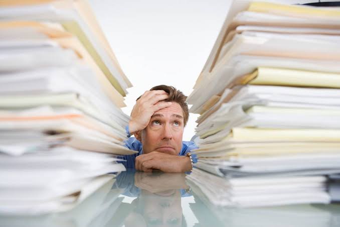 <p>do paperwork</p>