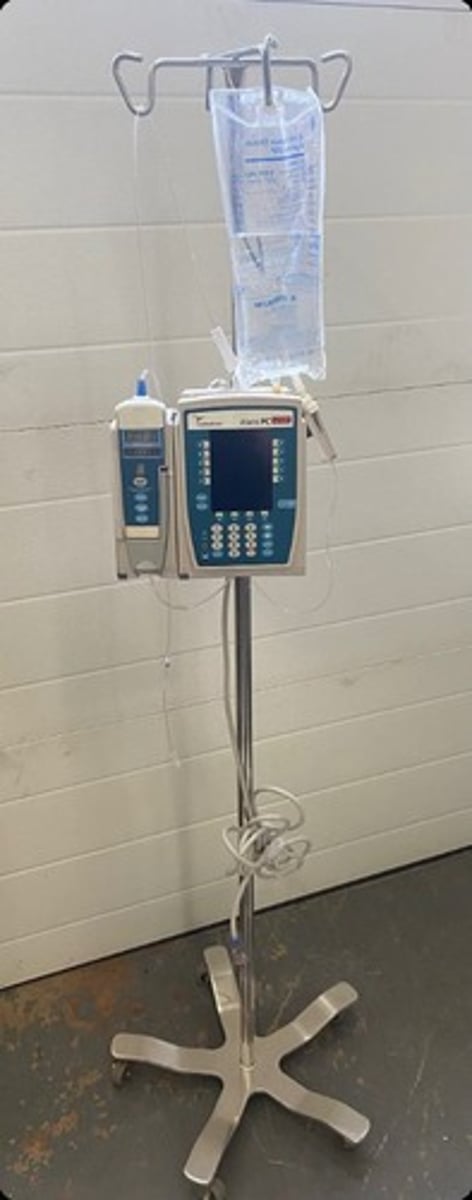 <p>bag of solution connected to tubing and needle</p>