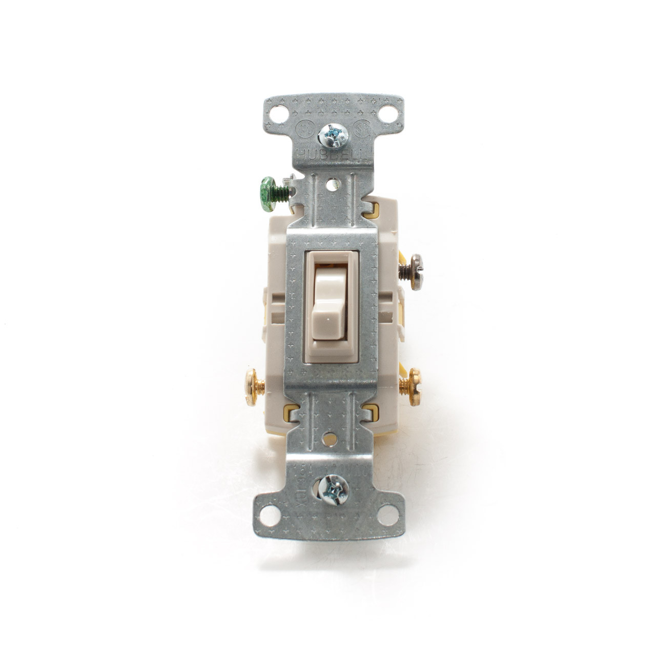 <p>Toggle switch with three terminals—one dark common screw and two lighter brass traveler screws—used to control a circuit from two locations, unlike single-pole switches.</p>