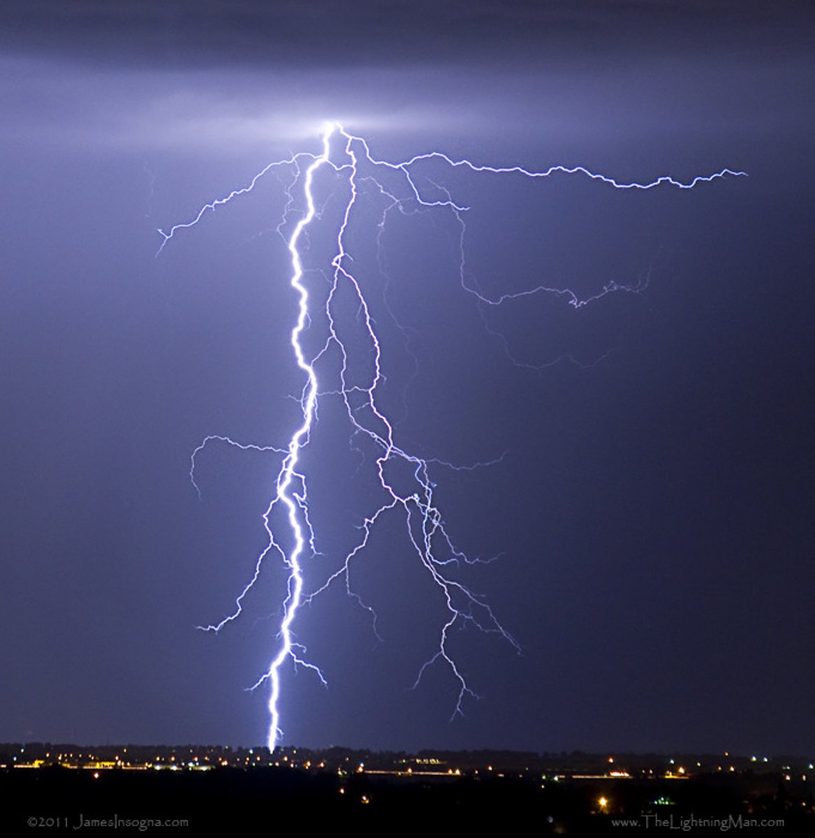 <p>A flash of light in the sky during a storm.</p>