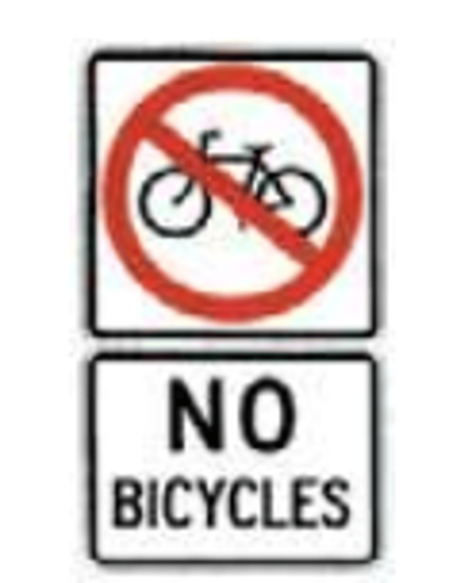 <p>A sign indicating that bicycles are prohibited from entering this roadway.</p>