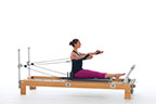 <p><strong>Setup</strong></p><ul><li><p>Sitting upright facing footbar, legs straight and together, pelvis against shoulder rests, arms in T position, micro-bend in elbows, hands in straps, palms facing forward</p></li><li><p>Resistance: light to medium | <strong>Springs: 1B or 1R</strong></p></li></ul><p><strong>Movement</strong></p><ul><li><p>Exhale: Move arms forward</p></li><li><p>Inhale: Move arms back, return to start position</p></li></ul><p><strong>Muscle Focus</strong></p><ul><li><p>Shoulder horizontal adductors</p></li><li><p>Shoulder flexors</p></li><li><p>Scapular stabilizers</p></li><li><p>Spinal extensors</p></li></ul><p><strong>Objectives</strong></p><ul><li><p>Shoulder horizontal adductor strength</p></li><li><p>Shoulder flexor control</p></li><li><p>Scapular stabilization</p></li><li><p>Trunk stabilization</p></li></ul><p><strong>Cues</strong></p><ul><li><p>Maintain scapular stabilization</p></li><li><p>Move arms along horizontal line at shoulder height, parallel to floor</p></li><li><p>Move arms forward until parallel with each other</p></li></ul><p></p>