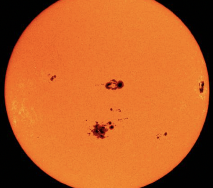 <p><span>Cooler, darker areas on the Sun's surface (photosphere) caused by intense magnetic field activity that inhibits heat transfer</span></p>