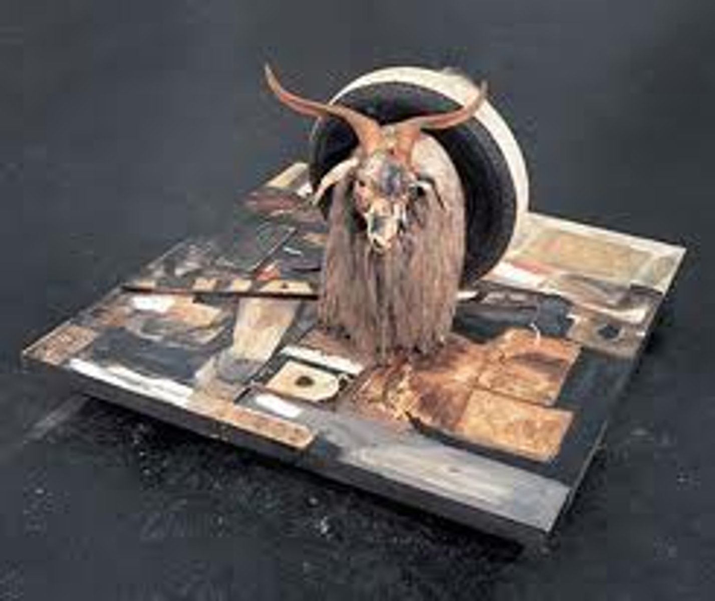 <p>- American painter and graphic artist</p><p>- combines aka ready-mades with a new name</p><p>- Bed(1955): used his own bed sheets as canvas</p><p>- Monogram(1959): stuffed goat, tennis ball, police barrier, tire, heel of a shoe, paint</p><p>- mixed media: silkscreen + paint</p>