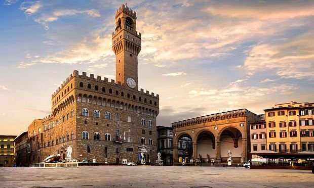 <p>built in Middle Ages, asymmetrical clock tower (common in M.A.), Greco-Roman style art on interior</p>