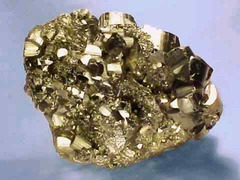 <p>Shiny gold mineral but with different properties than gold; known as 'fools gold.'</p>