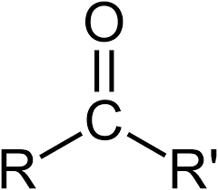<p>carbon atom double-bonded to an oxygen atom (\(C=O\)), where that central carbon is attached to two other carbon atoms</p>