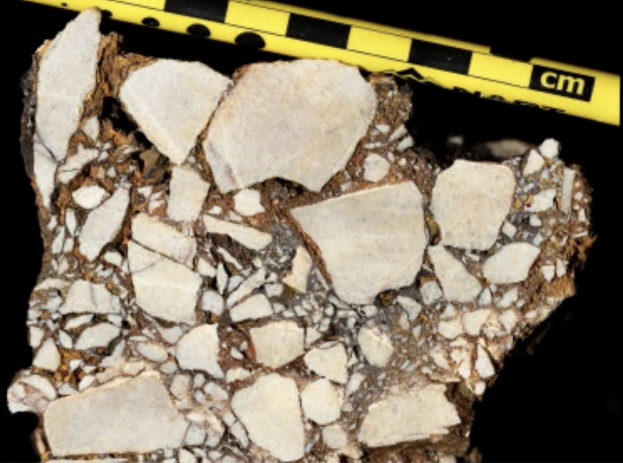 <p>Poorly sorted, angular clasts >2mm in diameter. Finer-grain sediments constitute the matrix.</p>