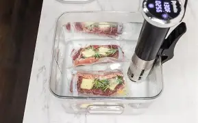 <p>Cooking foods that are vacuum-sealed in plastic pouches.</p>