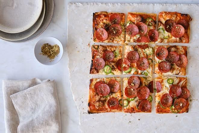 <p>Our most meat-packed pizza yet. Spicy no-vodka sauce, turkey sausage, pepperoni, shaved white onions, fontina and mozzarella cheese blend, and spicy jalapeños, topped with our super secret pizza seasoning.</p><p>*Guests can select if they would like it sliced or not sliced</p><p>Modification options: None</p><p>Allergens: Dairy, Garlic</p>